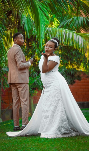Nigerian couple celebrating a joyful wedding moment